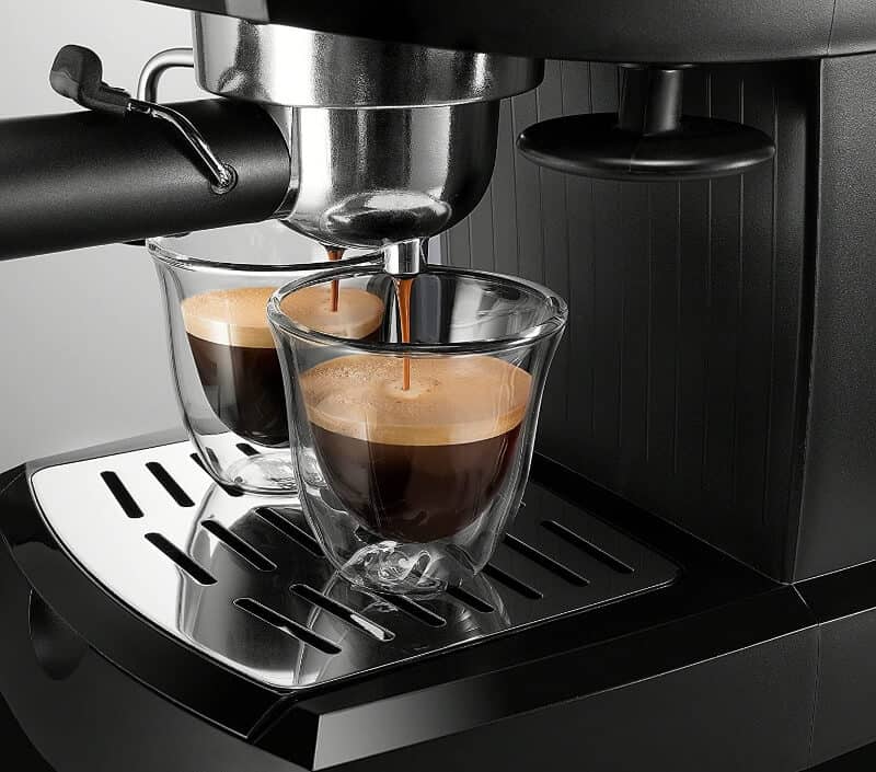 Delonghi espresso maker brewing coffee